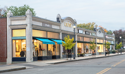 Street view of Wellesley, MA, highlighting boutique shops and storefronts with a classic architectural style