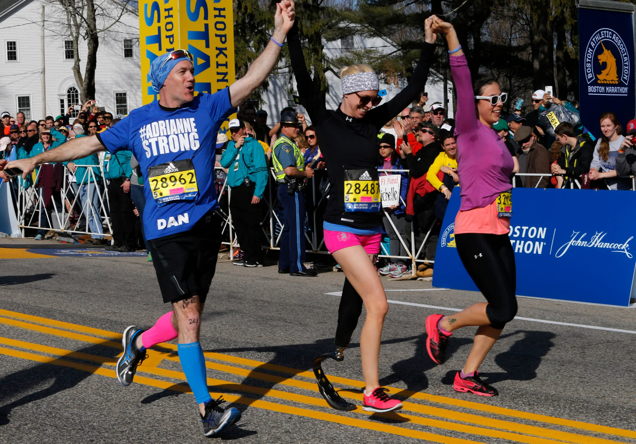 Adrianne Haslet (center) at the start of the 2018 Boston Marathon